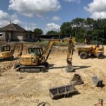 construction vehicles in yard