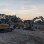 diggers in construction yard